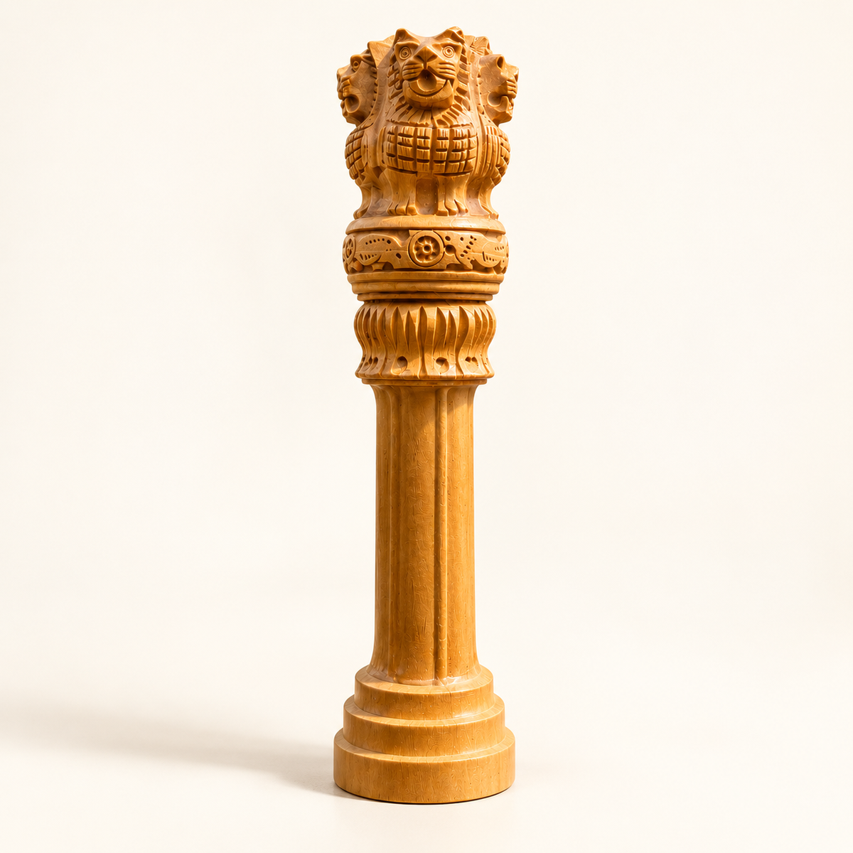 Handcrafted wooden Ashoka Lion Pillar with intricate Indian carvings and a tiered base, displayed as traditional Indian home décor.